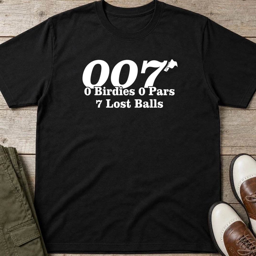 007 Golf T-Shirt in Black lying on a plain floor. T-shirt is a unisex cut and 100 per cent cotton.