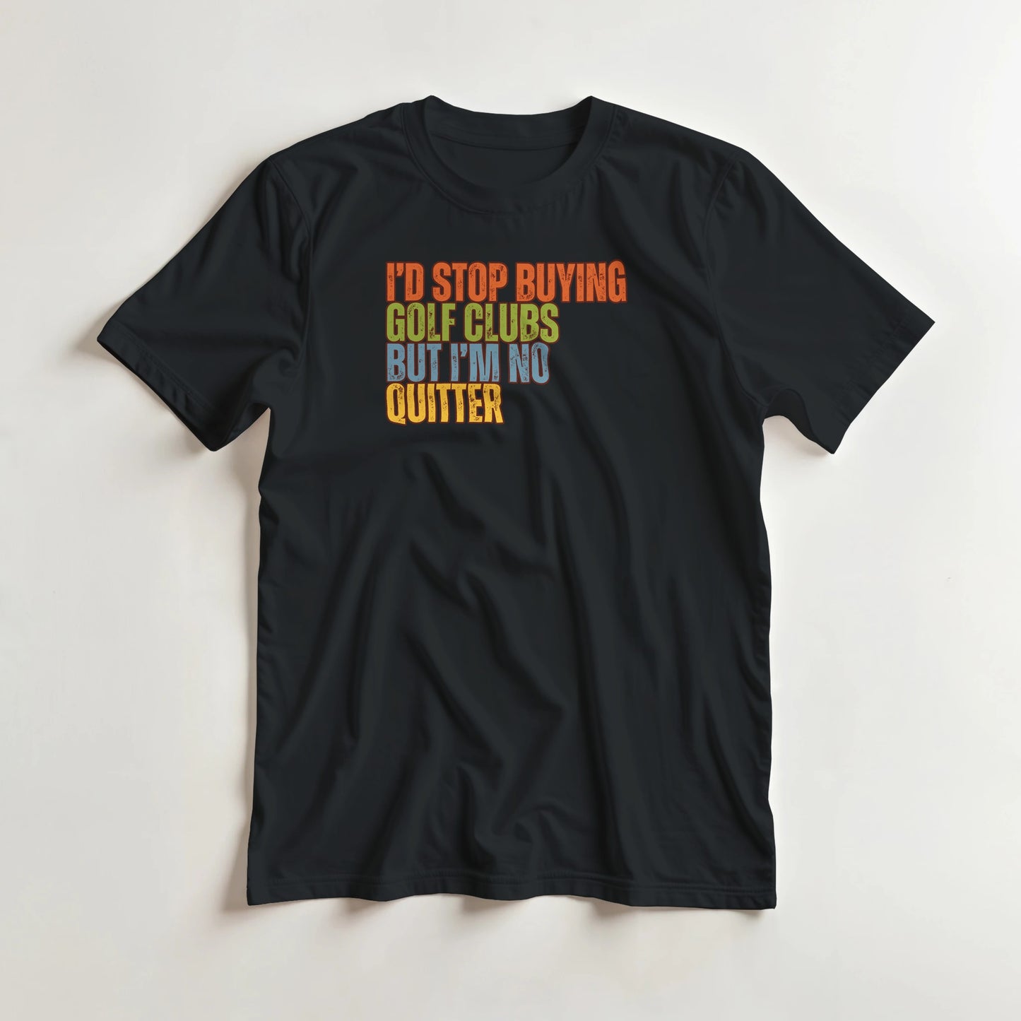 I'd Stop T-Shirt in Black lying on a plain floor. T-shirt is a unisex cut and 100 per cent cotton.