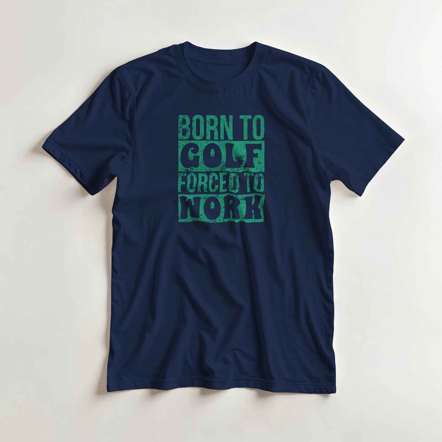 Born To Golf T-Shirt in Navy lying on a plain floor. T-shirt is a unisex cut and 100 per cent cotton.