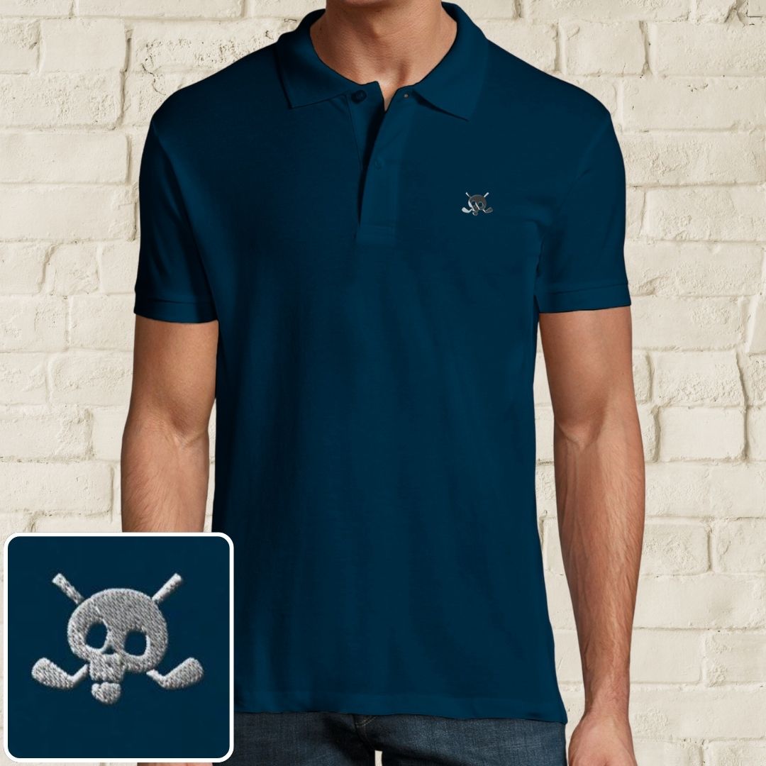 Skull Polo in Denim on a light wooden floor lying next to headphones and golf shoes.