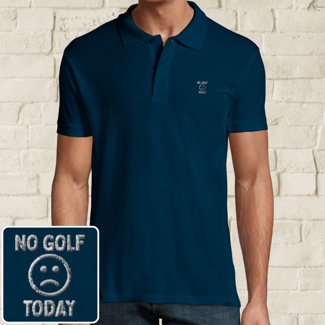 No Golf Today Polo in Denim on a light wooden floor lying next to headphones and golf shoes.