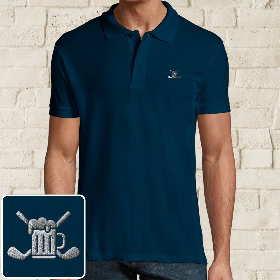 Beer Polo in denim on a light wooden floor lying next to headphones and golf shoes.