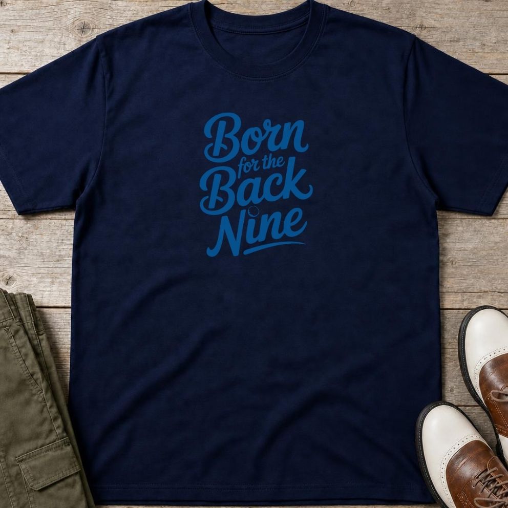 Back Nine T-Shirt in Navy lying on a plain floor. T-shirt is a unisex cut and 100 per cent cotton.