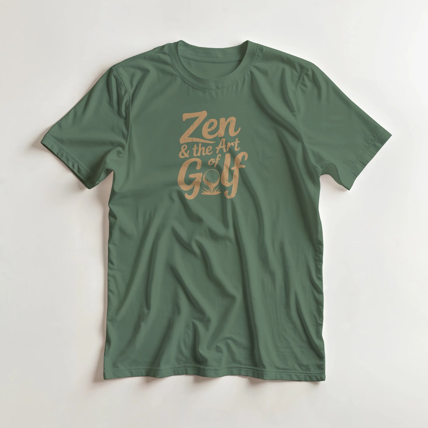 Zen Golf T-Shirt in Military Green lying on a plain floor. T-shirt is a unisex cut and 100 per cent cotton.