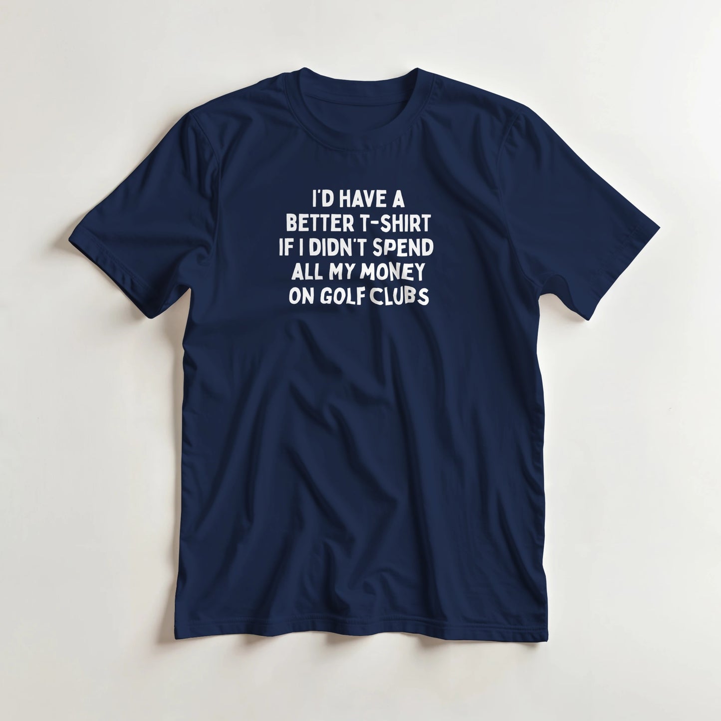 A Better T-Shirt in Navy 3XL lying on a plain floor. T-shirt is a unisex cut and 100 per cent cotton.