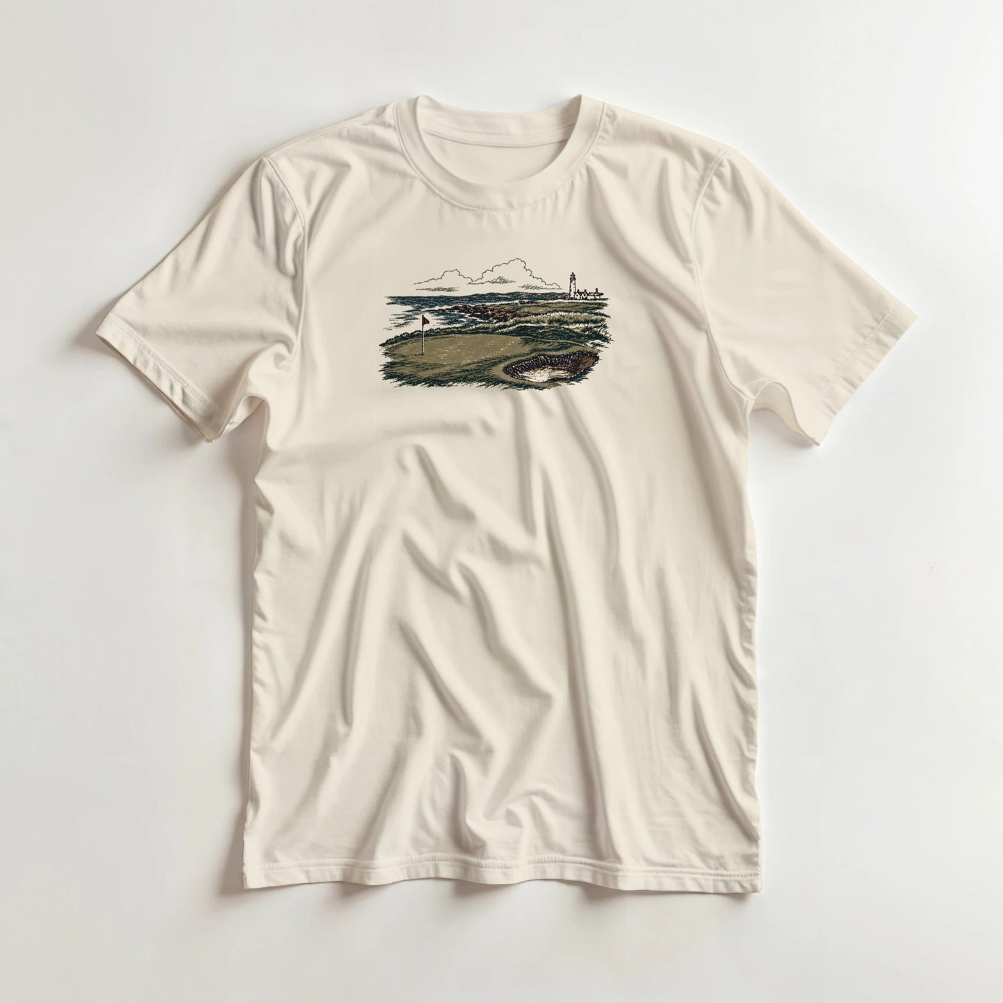 The Links T-Shirt in lying on a plain floor. T-shirt is a unisex cut and 100 per cent cotton.