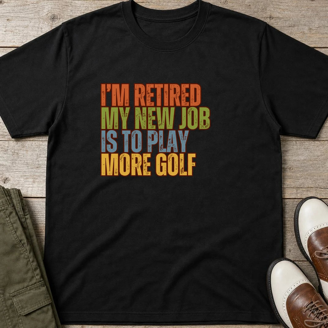 I'm Retired T-Shirt in Black lying on a plain floor. T-shirt is a unisex cut and 100 per cent cotton.