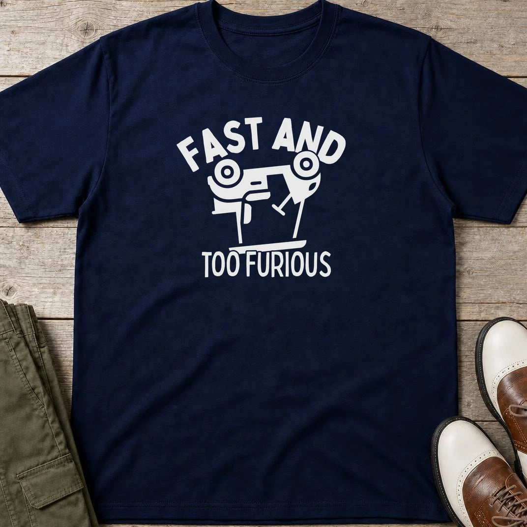 Too Furious T-Shirt in Navy lying on a plain floor. T-shirt is a unisex cut and 100 per cent cotton.
