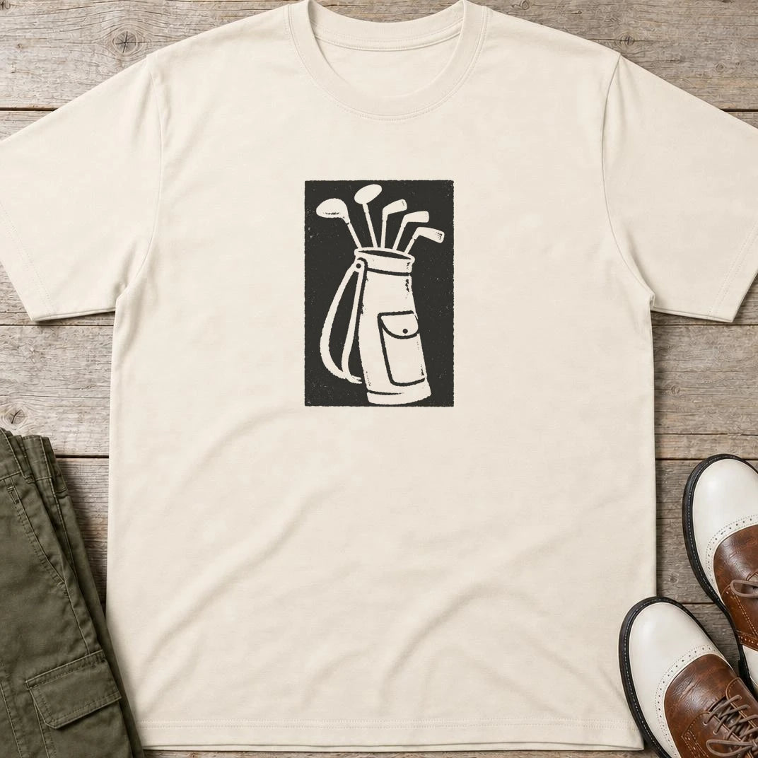 Block-Print Golf T-Shirt in Natural lying on a plain floor. T-shirt is a unisex cut and 100 per cent cotton.
