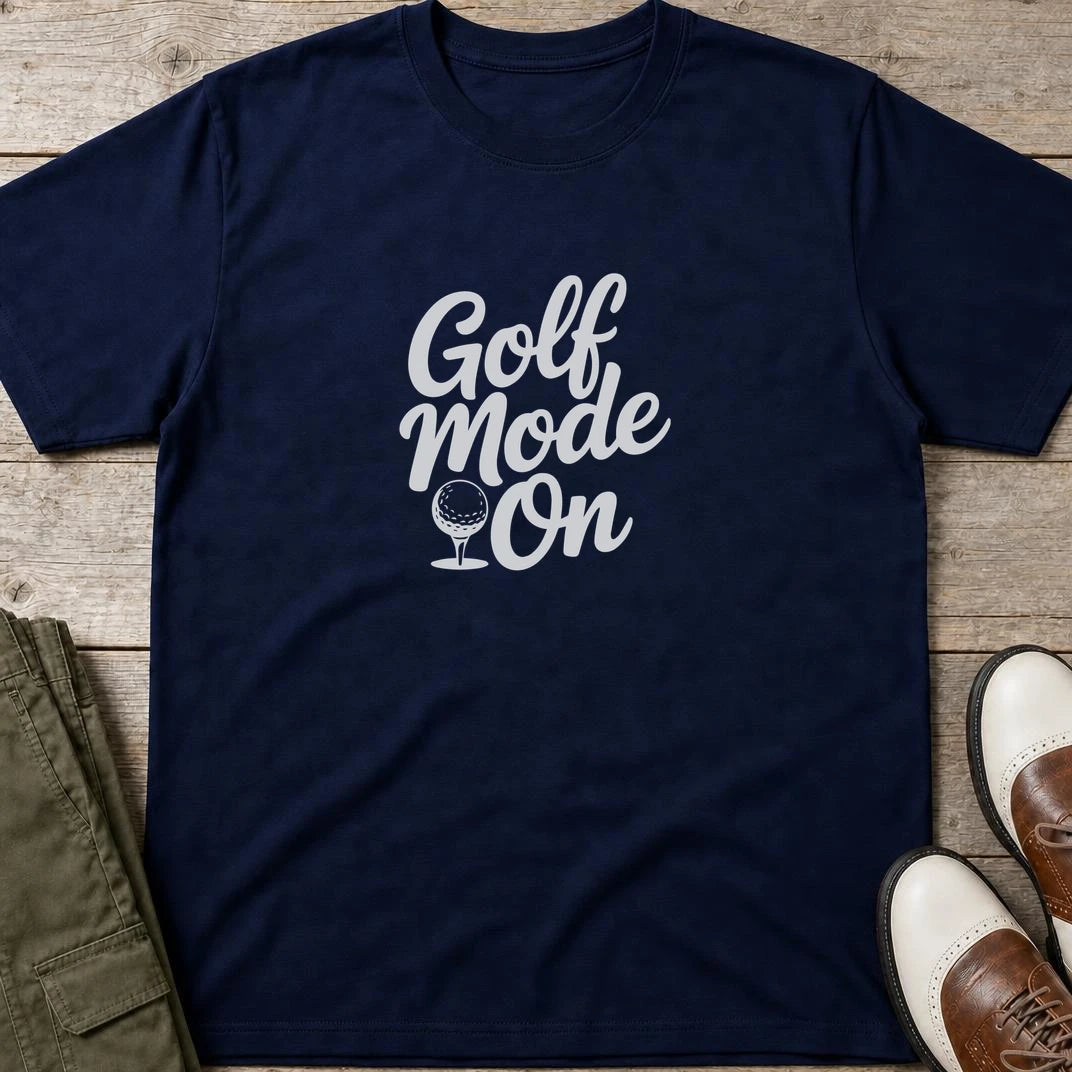 Mode T-Shirt in Navy lying on a plain floor. T-shirt is a unisex cut and 100 per cent cotton.