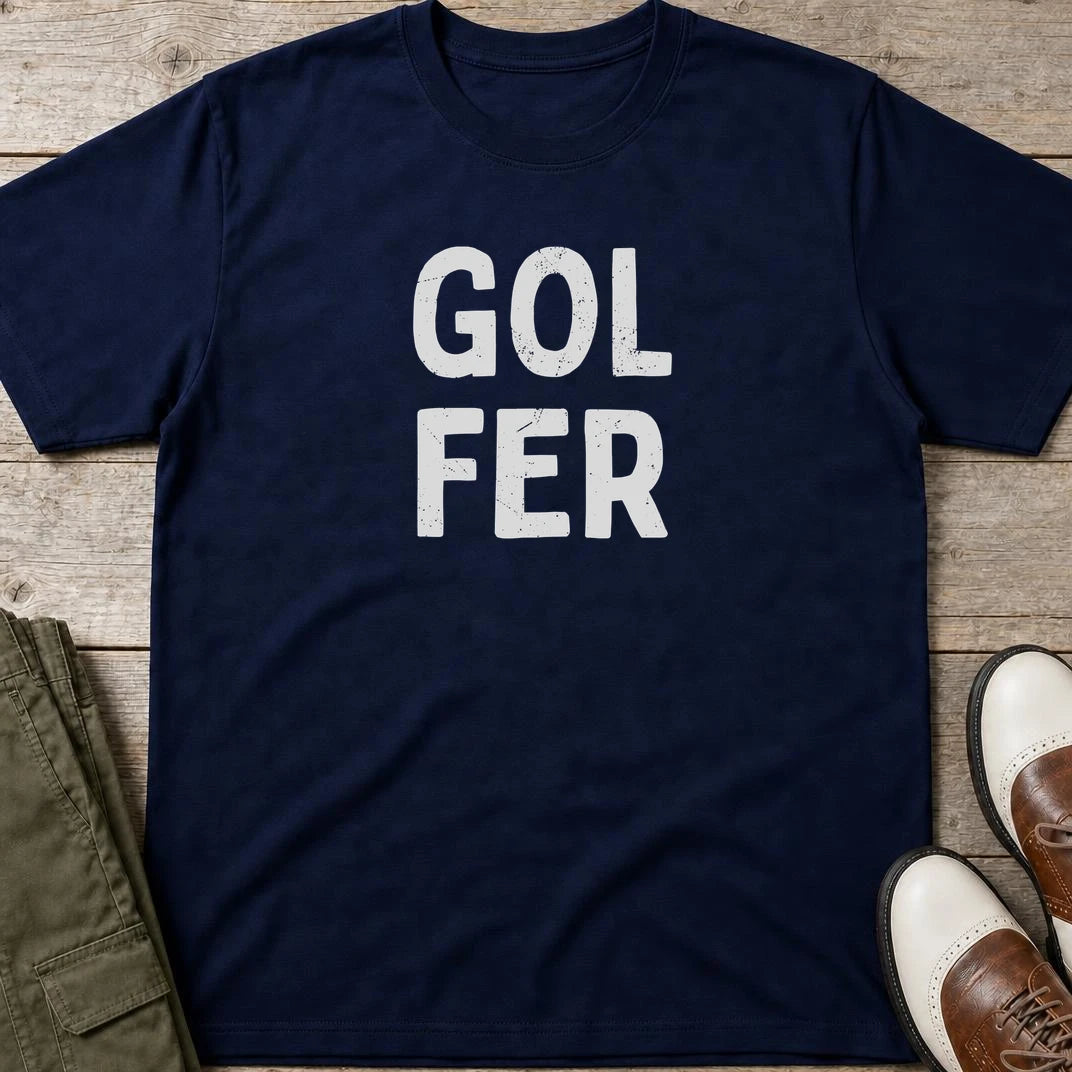 Gol Fer T-Shirt in Navy lying on a plain floor. T-shirt is a unisex cut and 100 per cent cotton.