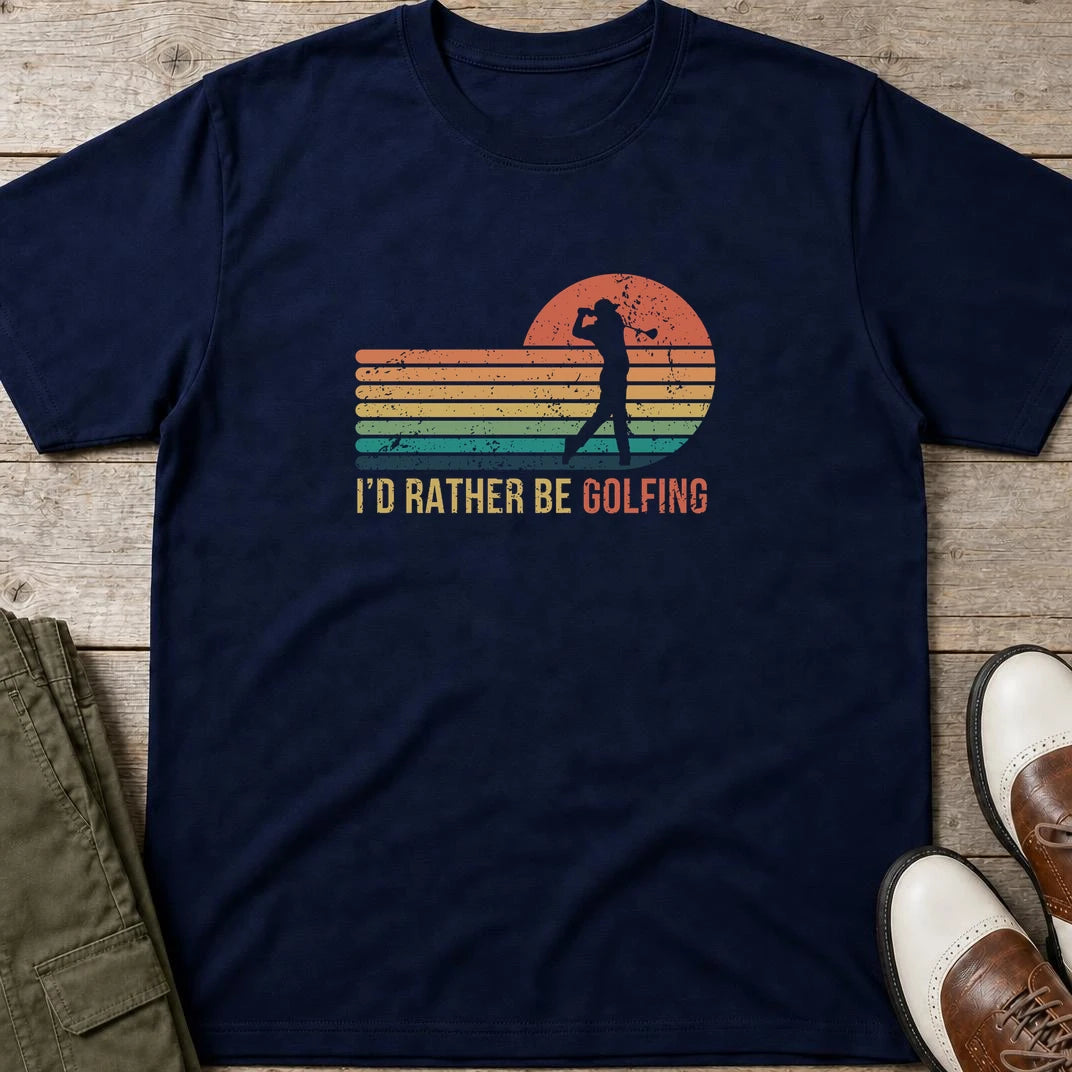 Rather Be Golfing T-Shirt in Navy lying on a plain floor. T-shirt is a unisex cut and 100 per cent cotton.