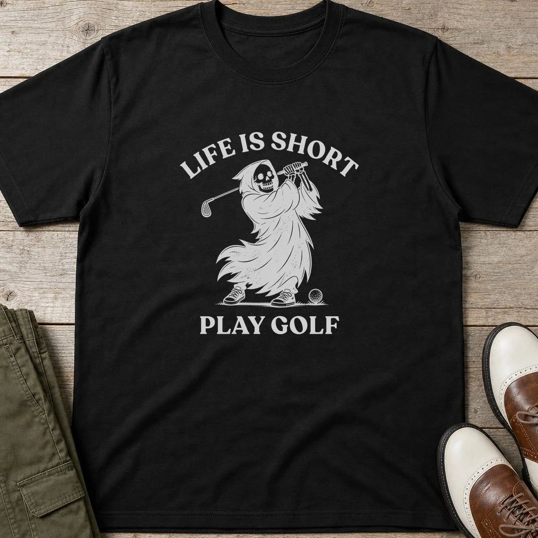 Life Is Short T-Shirt in Black lying on a plain floor. T-shirt is a unisex cut and 100 per cent cotton.