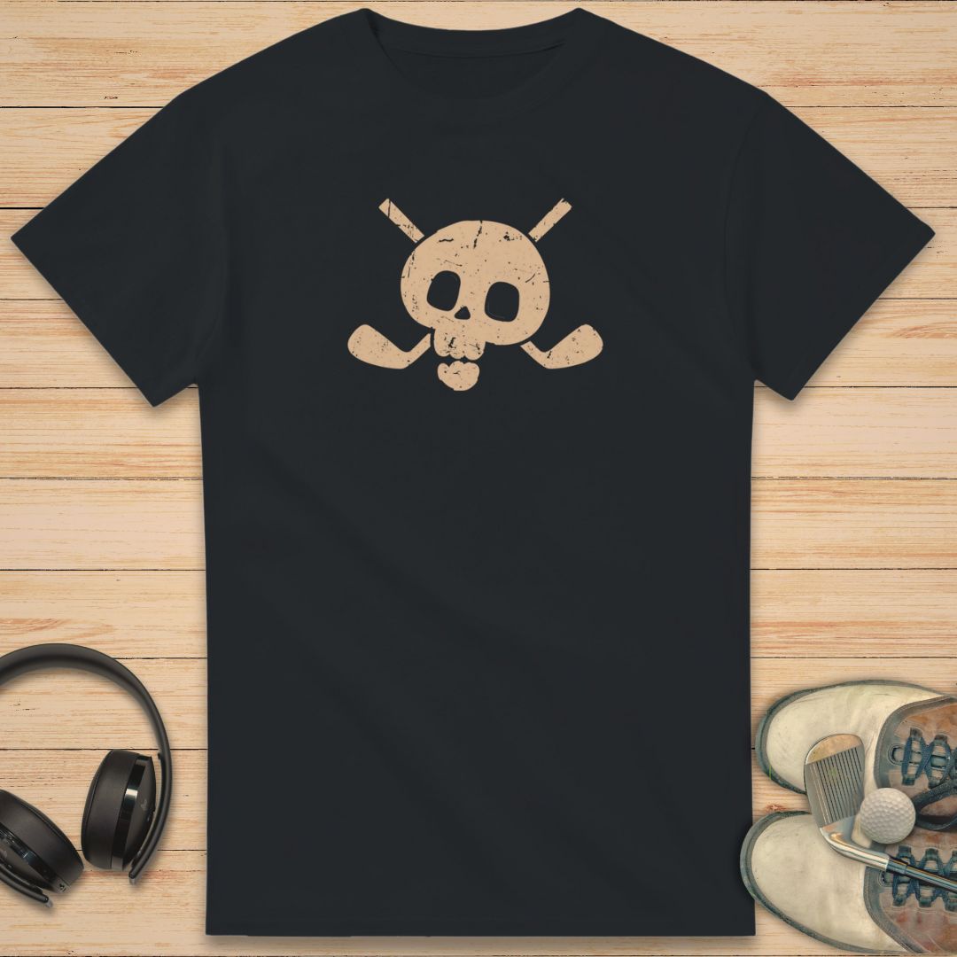 Skull X-Clubs T-Shirt in Black on a light wooden floor lying next to headphones and golf shoes.