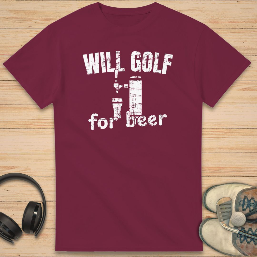For Beer T-Shirt in Maroon on a light wooden floor lying next to headphones and golf shoes.