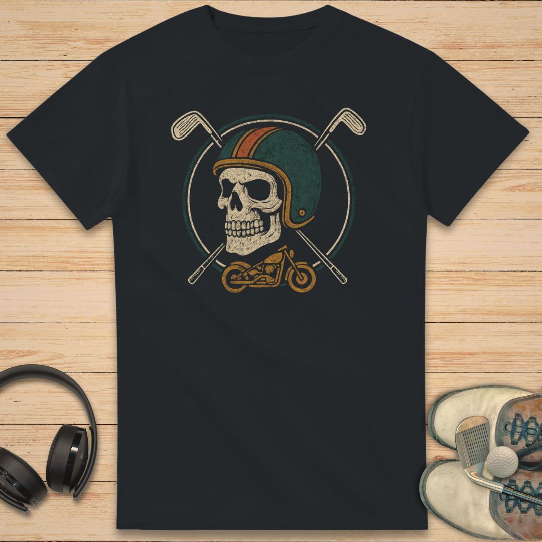 Golfing Biker T-Shirt in Black on a light wooden floor lying next to headphones and golf shoes.