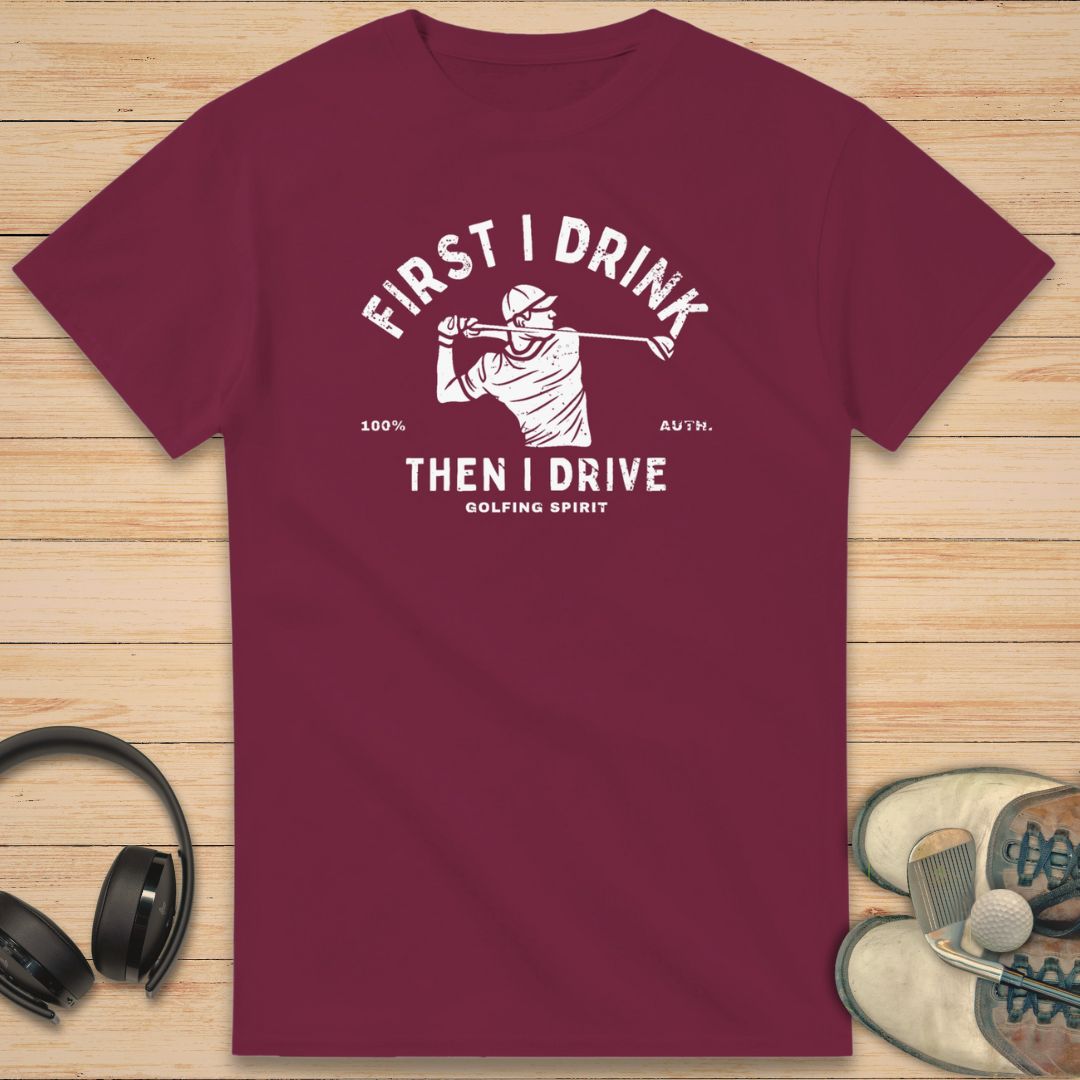 Golfing Spirit T-Shirt in Maroon on a light wooden floor lying next to headphones and golf shoes.