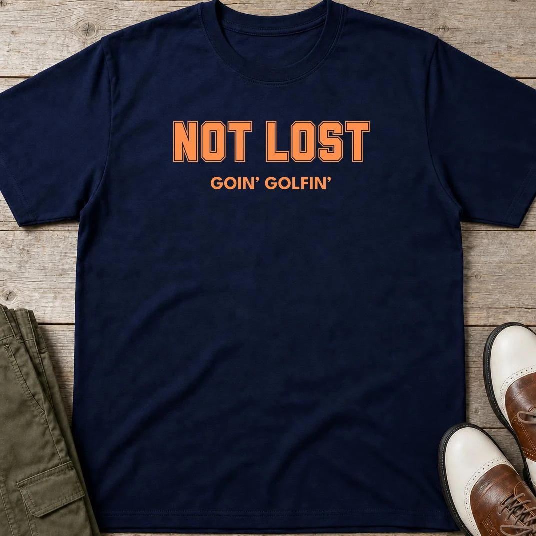 Not Lost T-Shirt in Navy lying on a plain floor. T-shirt is a unisex cut and 100 per cent cotton.