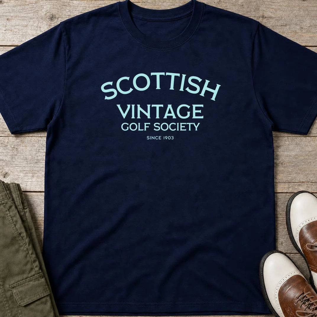 Scottish 1903 T-Shirt in Navy lying on a plain floor. T-shirt is a unisex cut and 100 per cent cotton.
