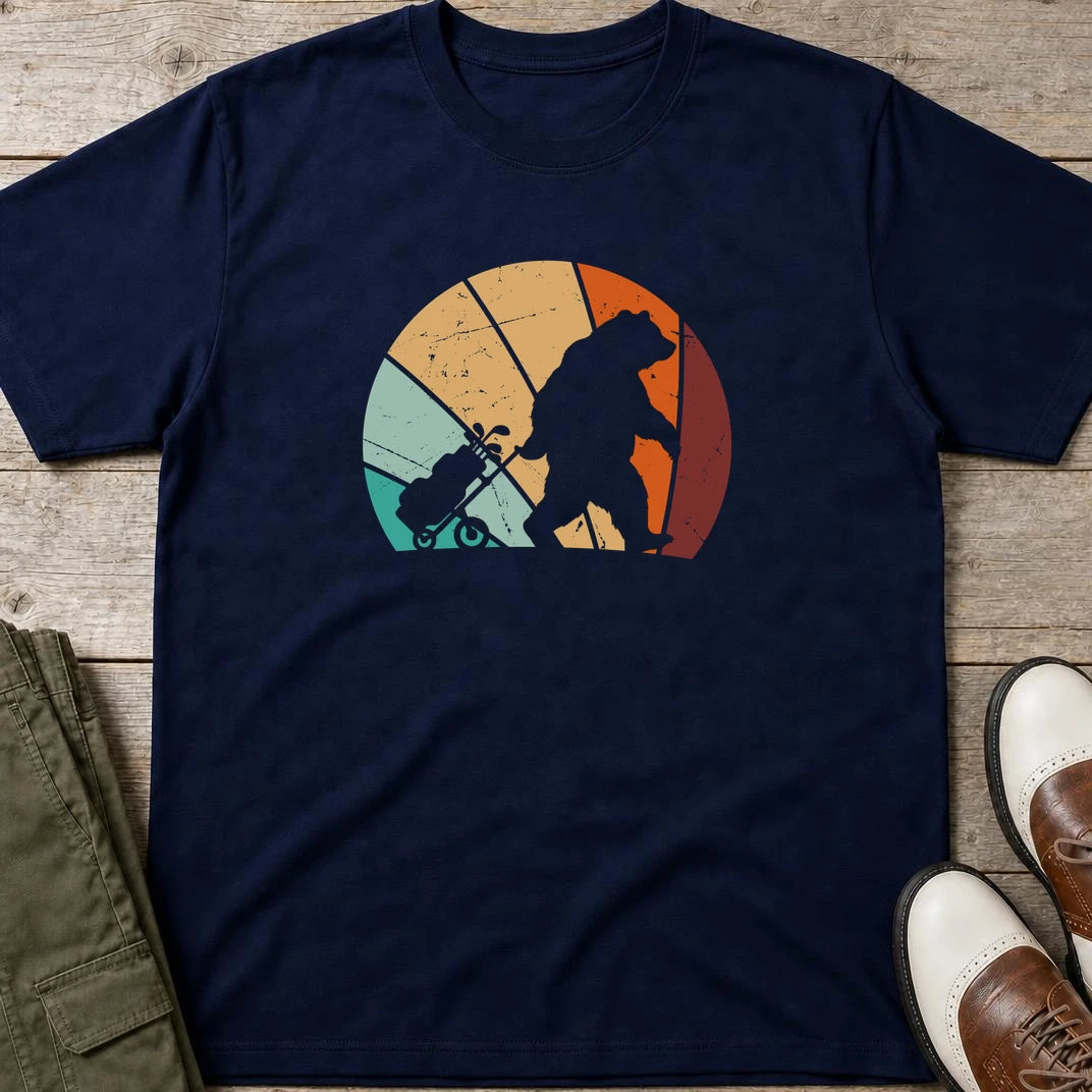 Trolley Bear T-Shirt in Navy lying on a plain floor. T-shirt is a unisex cut and 100 per cent cotton.