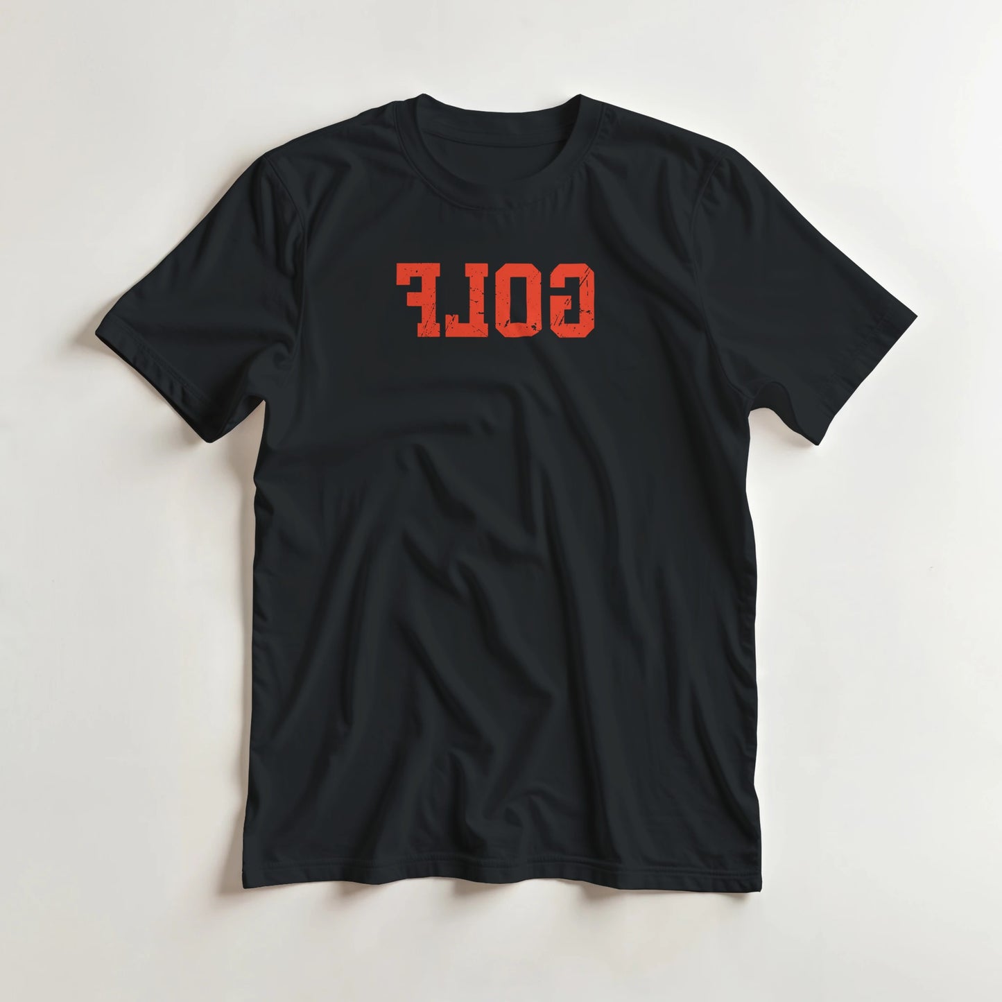 Golf Reverse T-Shirt in Black 3XL lying on a plain floor. T-shirt is a unisex cut and 100 per cent cotton.