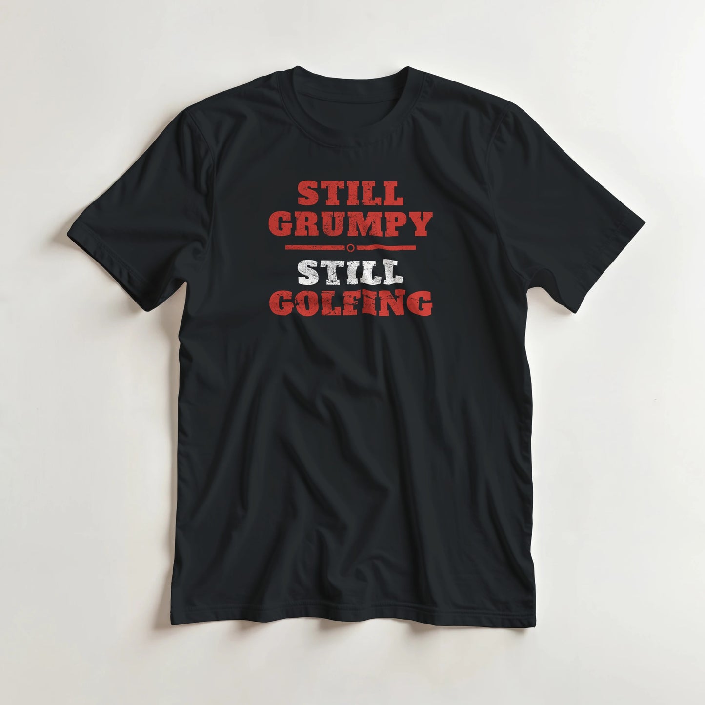Still Grumpy Red T-Shirt in Black 3XL lying on a plain floor. T-shirt is a unisex cut and 100 per cent cotton.