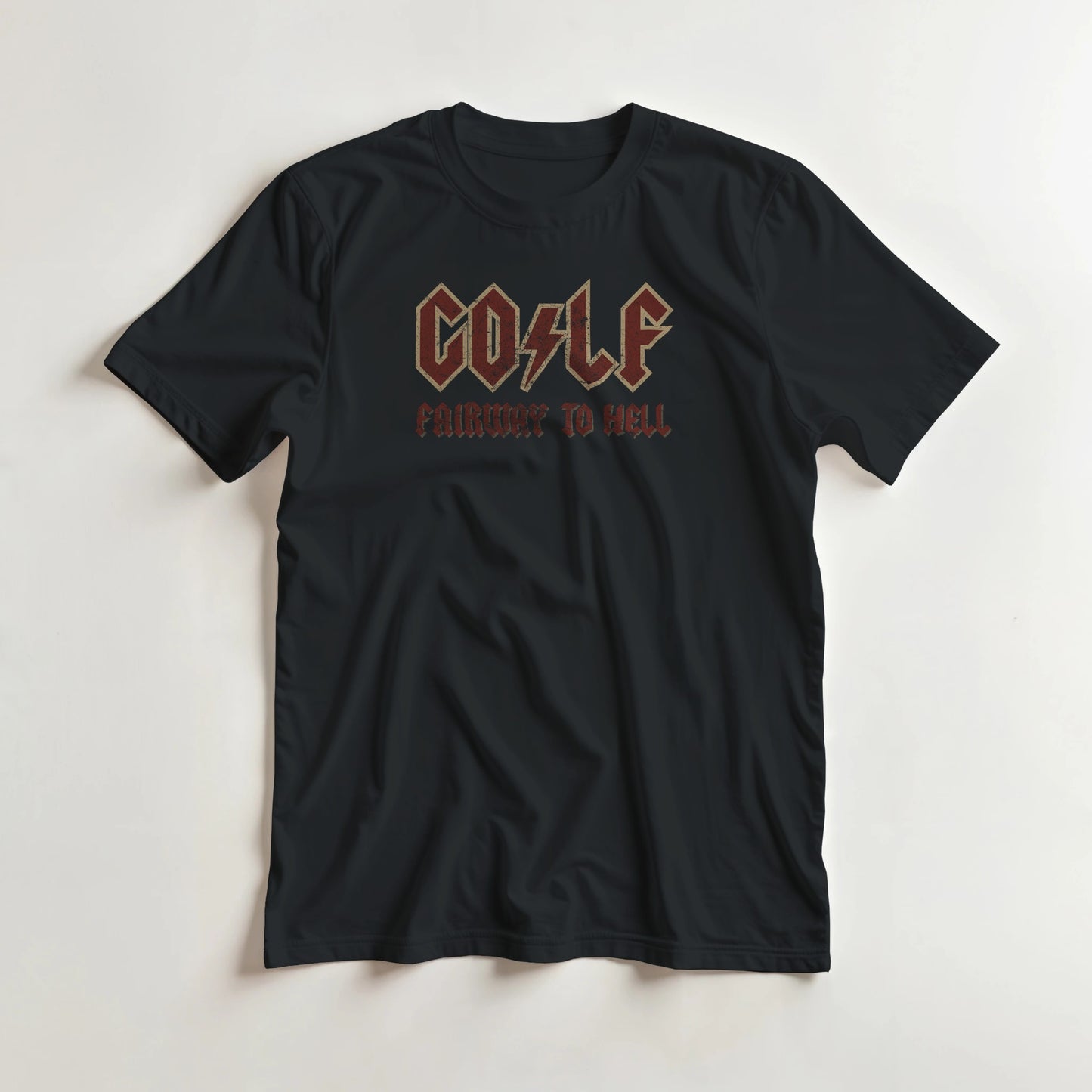 Fairway To Hell T-Shirt in Black lying on a plain floor. T-shirt is a unisex cut and 100 per cent cotton.