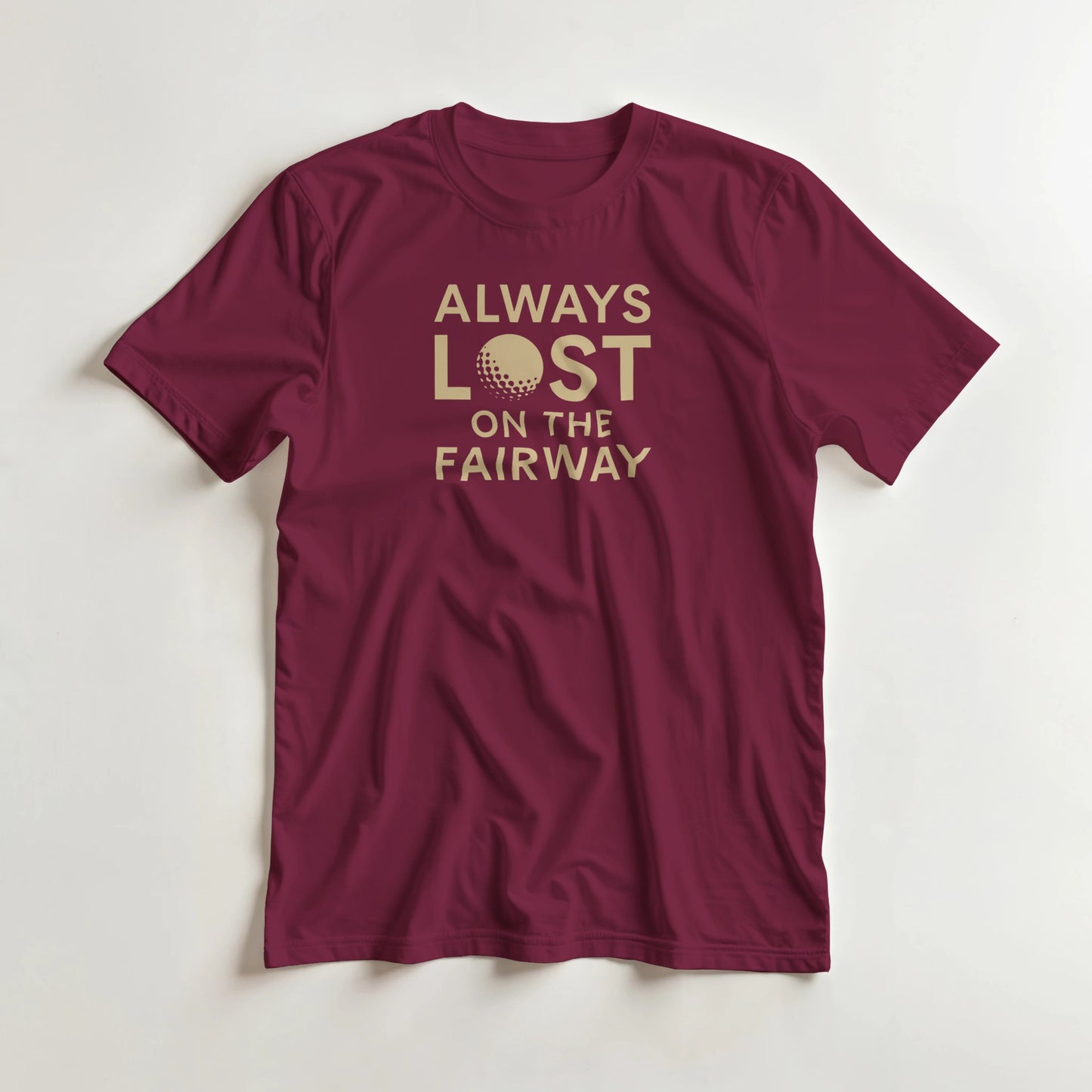 Always Lost T-Shirt in Maroon lying on a plain floor. T-shirt is a unisex cut and 100 per cent cotton.