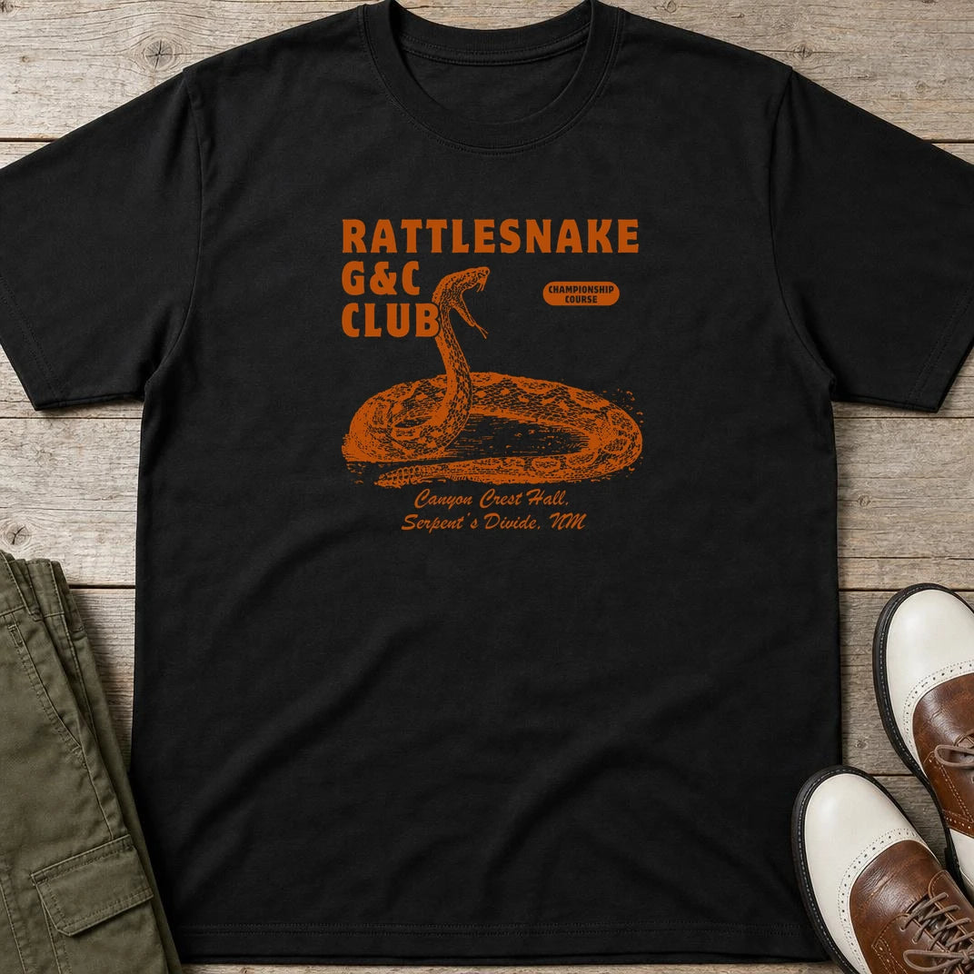 Rattlesnake G&C T-Shirt in Black lying on a plain floor. T-shirt is a unisex cut and 100 per cent cotton.