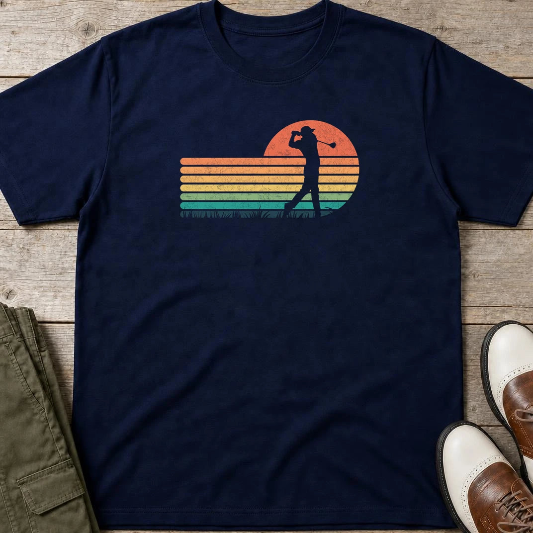 Vintage Golfer T-Shirt in Navy lying on a plain floor. T-shirt is a unisex cut and 100 per cent cotton.