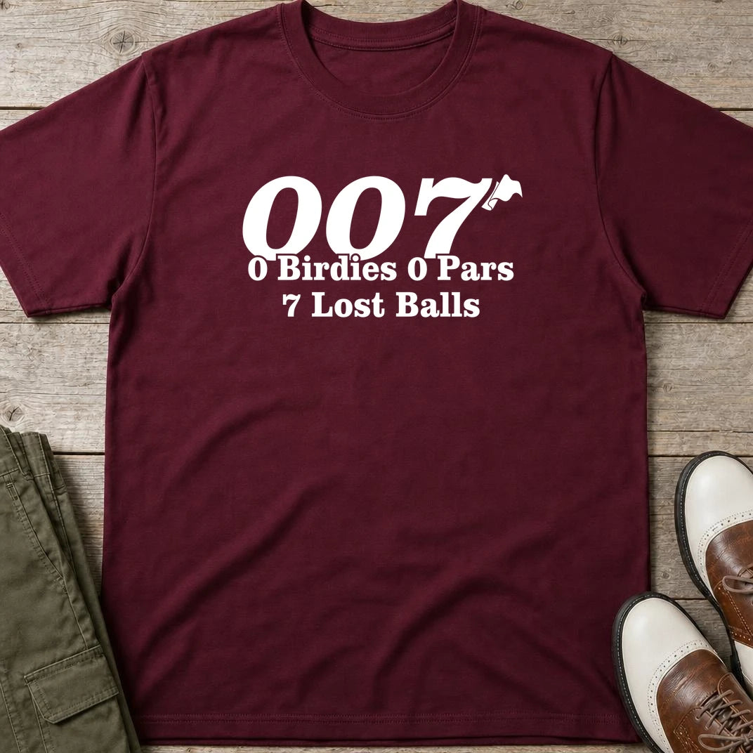 007 Golf T-Shirt in Maroon lying on a plain floor. T-shirt is a unisex cut and 100 per cent cotton.
