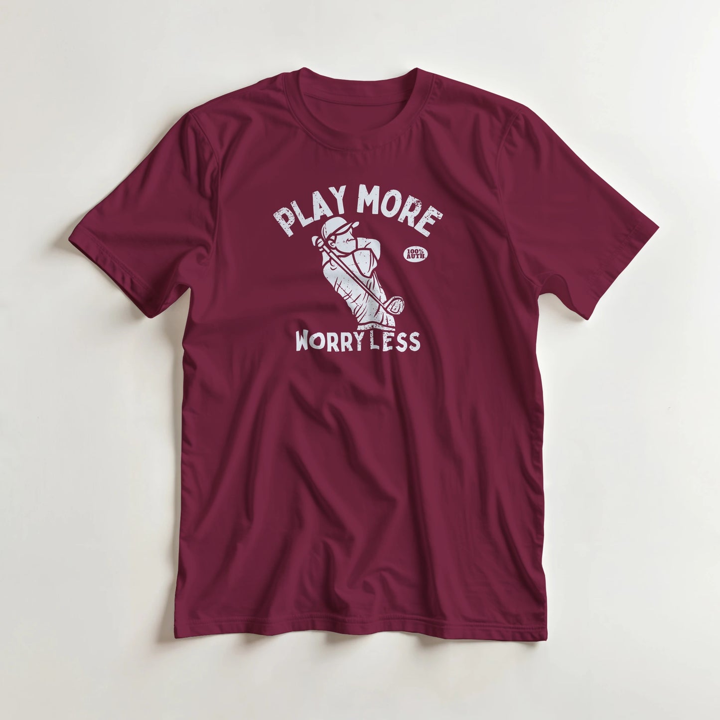 Worry Less T-Shirt in Maroon M lying on a plain floor. T-shirt is a unisex cut and 100 per cent cotton.