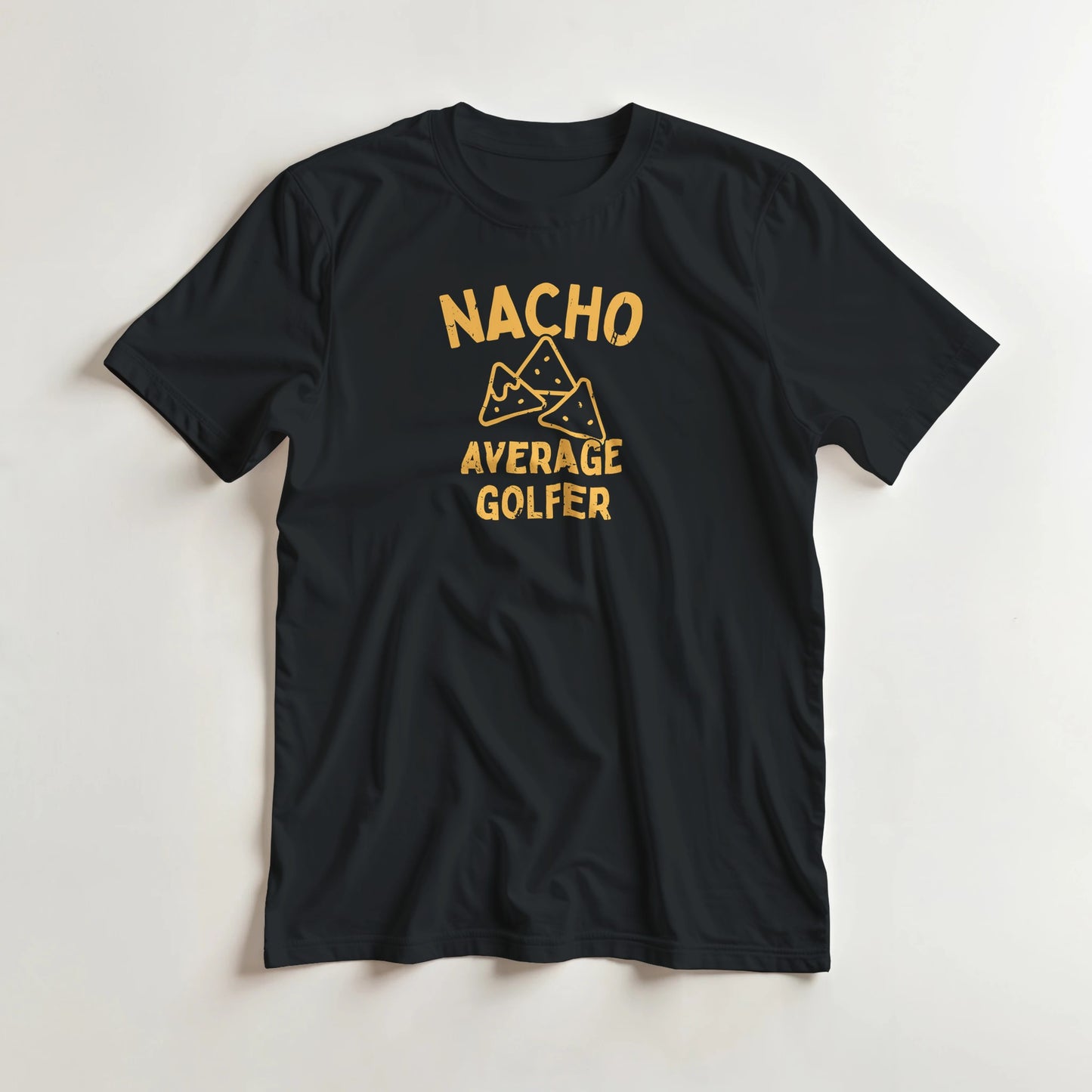 Nacho T-Shirt in Black S lying on a plain floor. T-shirt is a unisex cut and 100 per cent cotton.