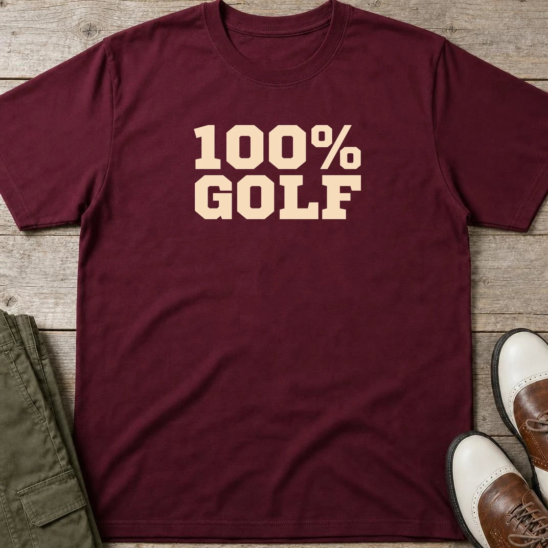 100% Golf T-Shirt in Maroon lying on a plain floor. T-shirt is a unisex cut and 100 per cent cotton.