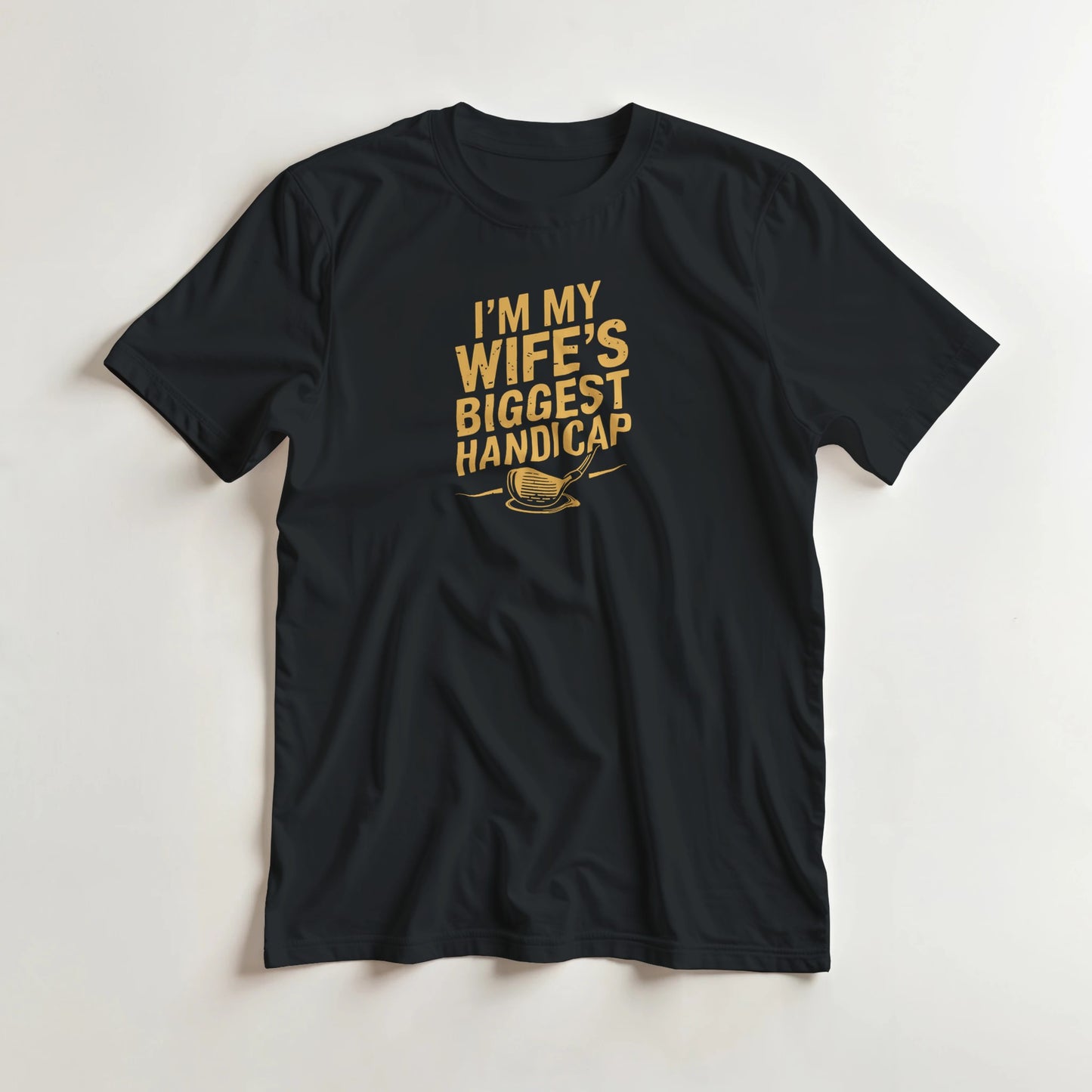 Biggest Handicap T-Shirt in Black lying on a plain floor. T-shirt is a unisex cut and 100 per cent cotton.