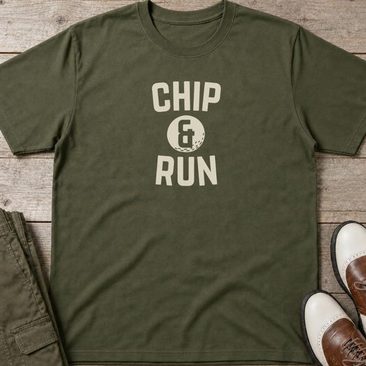 Chip & Run T-Shirt in Military Green lying on a plain floor. T-shirt is a unisex cut and 100 per cent cotton.