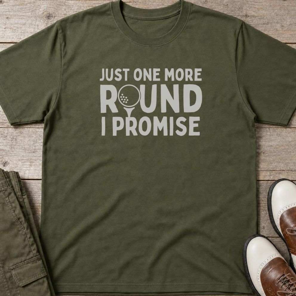 One More Round T-Shirt in Military Green lying on a plain floor. T-shirt is a unisex cut and 100 per cent cotton.