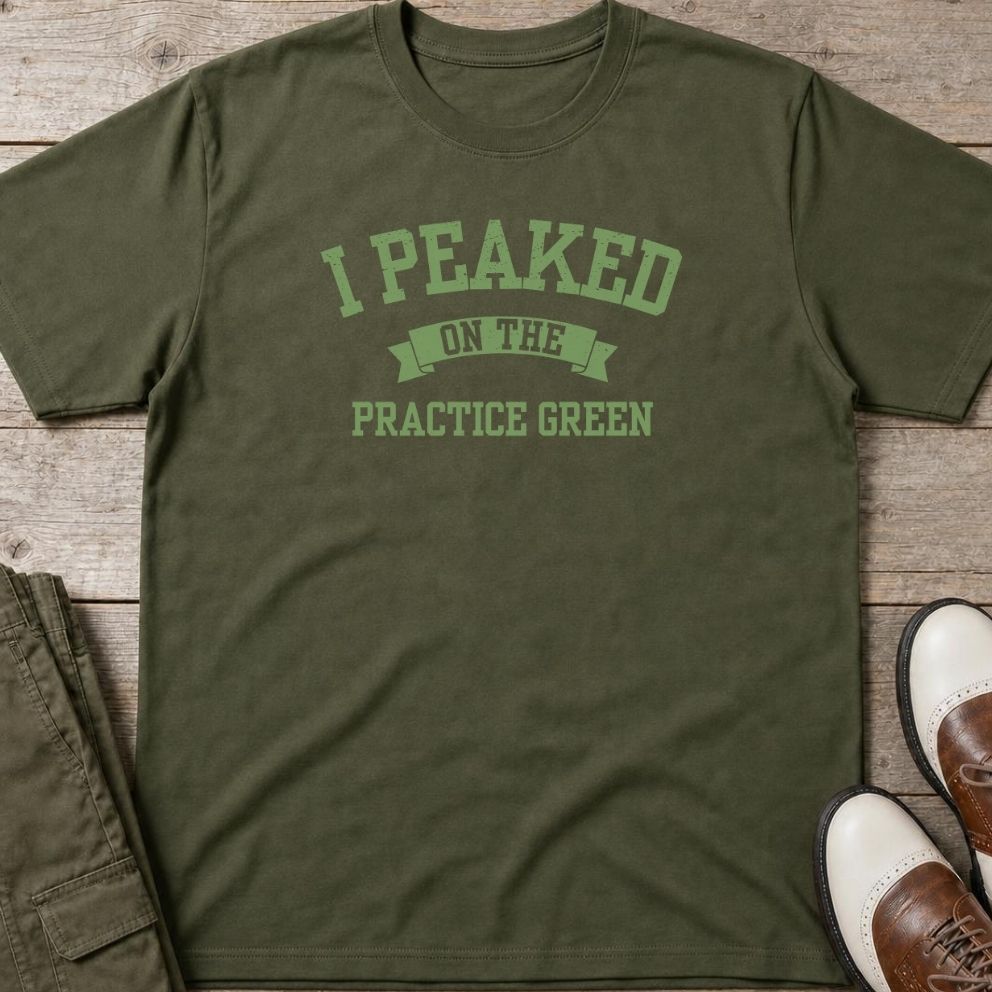 Practice Green T-Shirt in Military Green lying on a plain floor. T-shirt is a unisex cut and 100 per cent cotton.