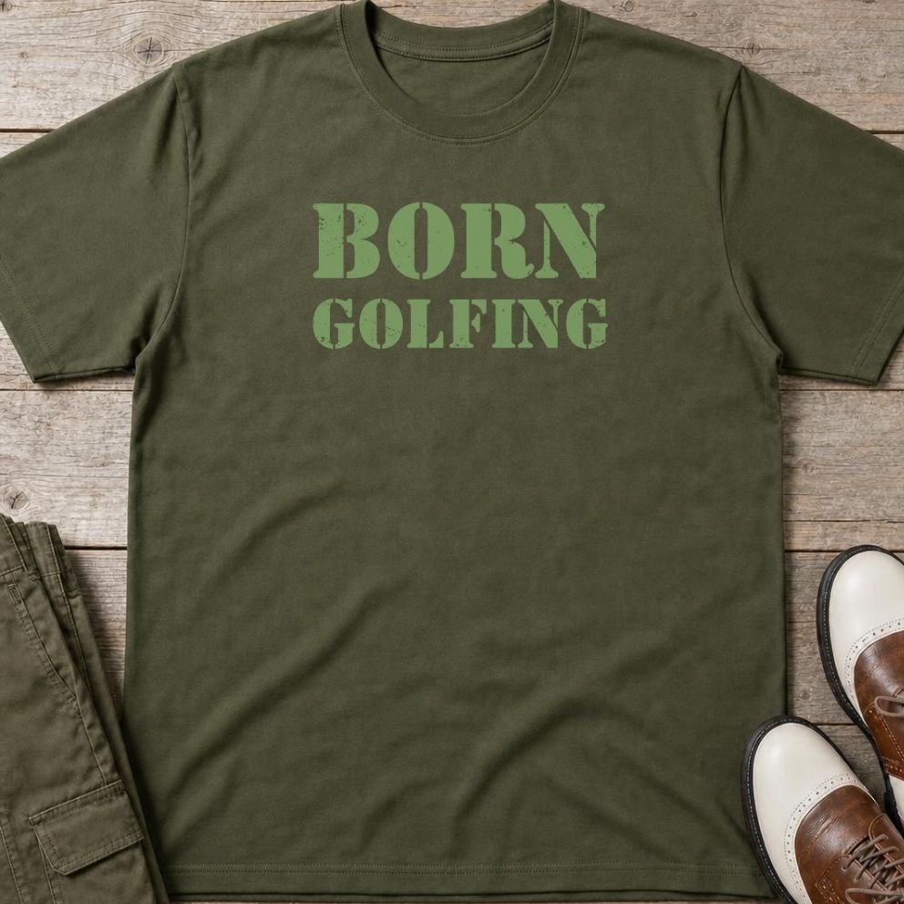 Born Golfing T-Shirt in Military Green lying on a plain floor. T-shirt is a unisex cut and 100 per cent cotton.