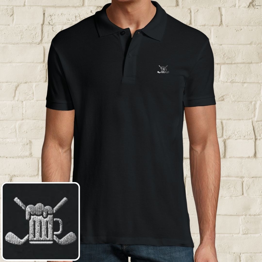 Beer Polo in Black on a light wooden floor lying next to headphones and golf shoes.