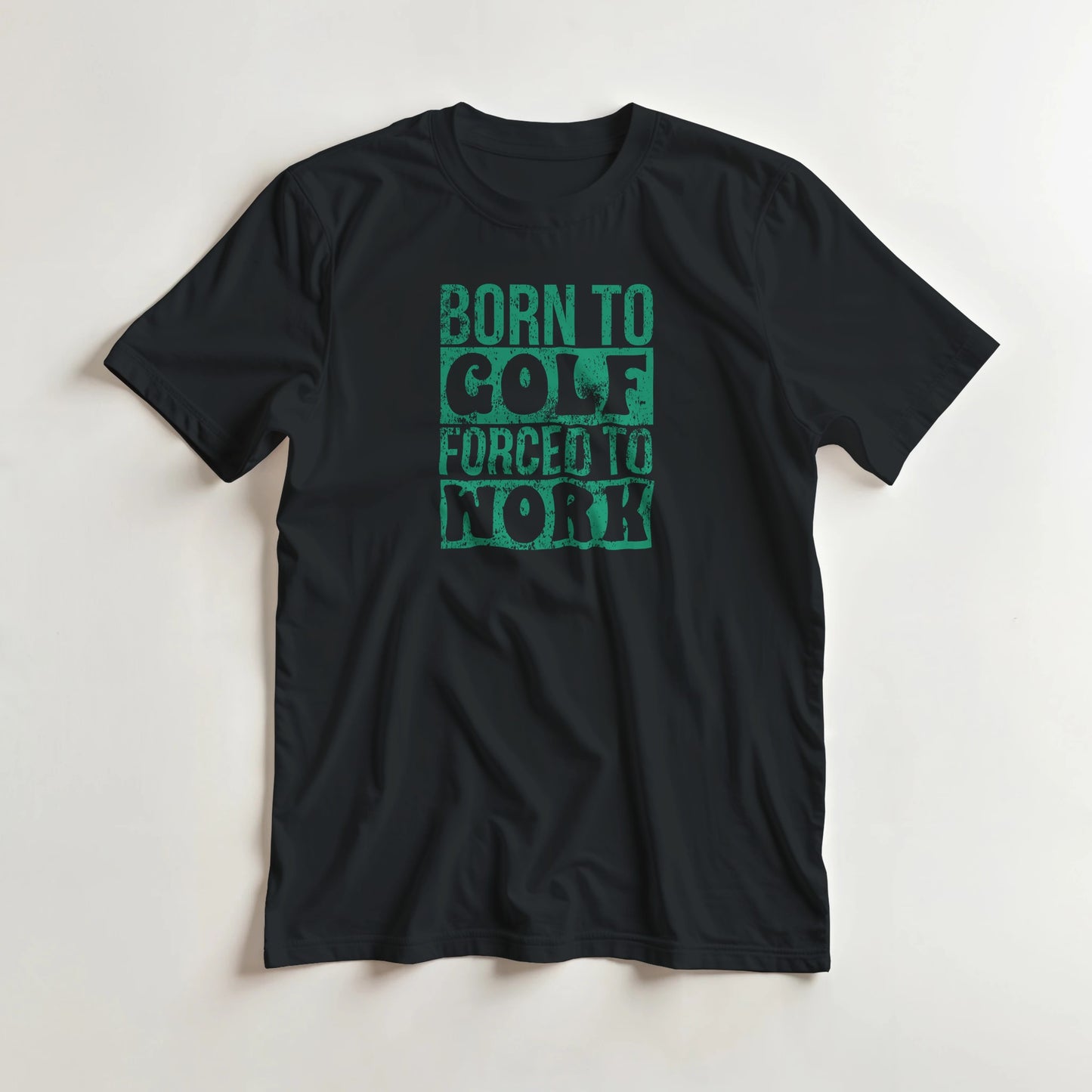 Born To Golf T-Shirt in Black lying on a plain floor. T-shirt is a unisex cut and 100 per cent cotton.