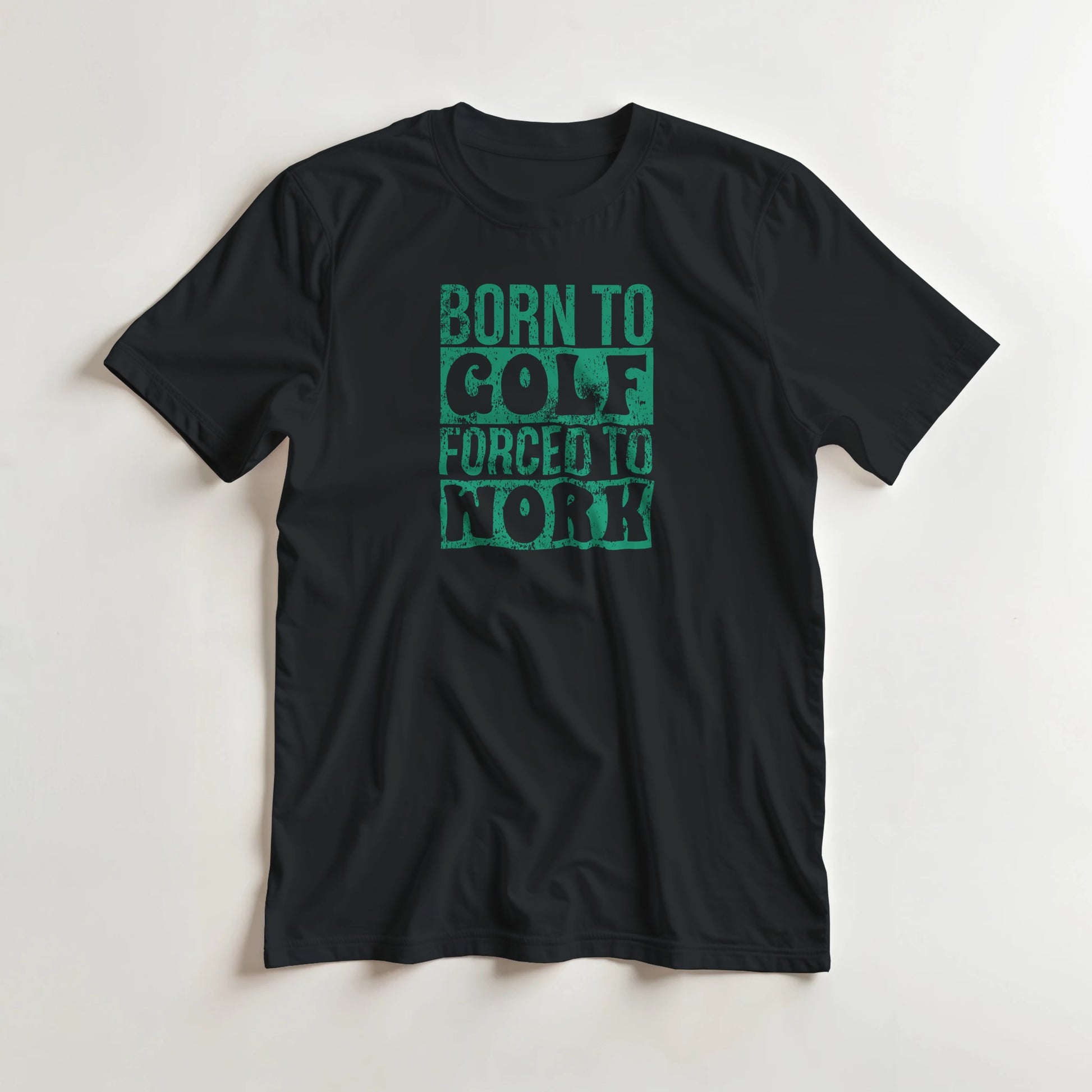Born To Golf T-Shirt in Black lying on a plain floor. T-shirt is a unisex cut and 100 per cent cotton.