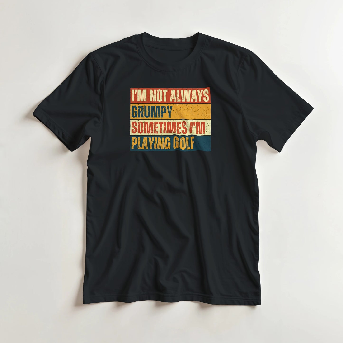 Grumpy Vintage T-Shirt in Black lying on a plain floor. T-shirt is a unisex cut and 100 per cent cotton.