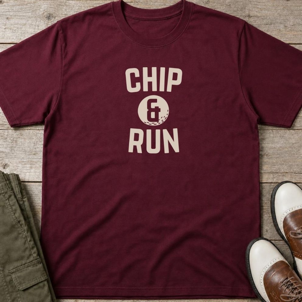 Chip & Run T-Shirt in Maroon lying on a plain floor. T-shirt is a unisex cut and 100 per cent cotton.