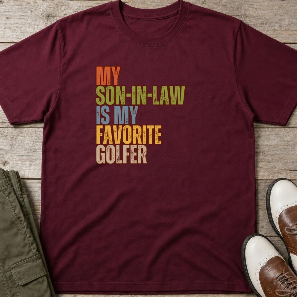 Son-In-Law T-Shirt in Maroon lying on a plain floor. T-shirt is a unisex cut and 100 per cent cotton.