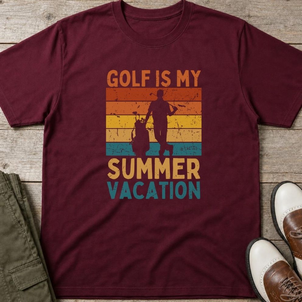 Summer Vacation T-Shirt in Maroon lying on a plain floor. T-shirt is a unisex cut and 100 per cent cotton.