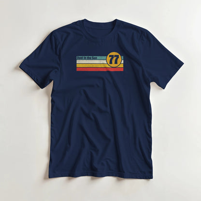 Duel Sun T-Shirt in Navy S lying on a plain floor. T-shirt is a unisex cut and 100 per cent cotton.