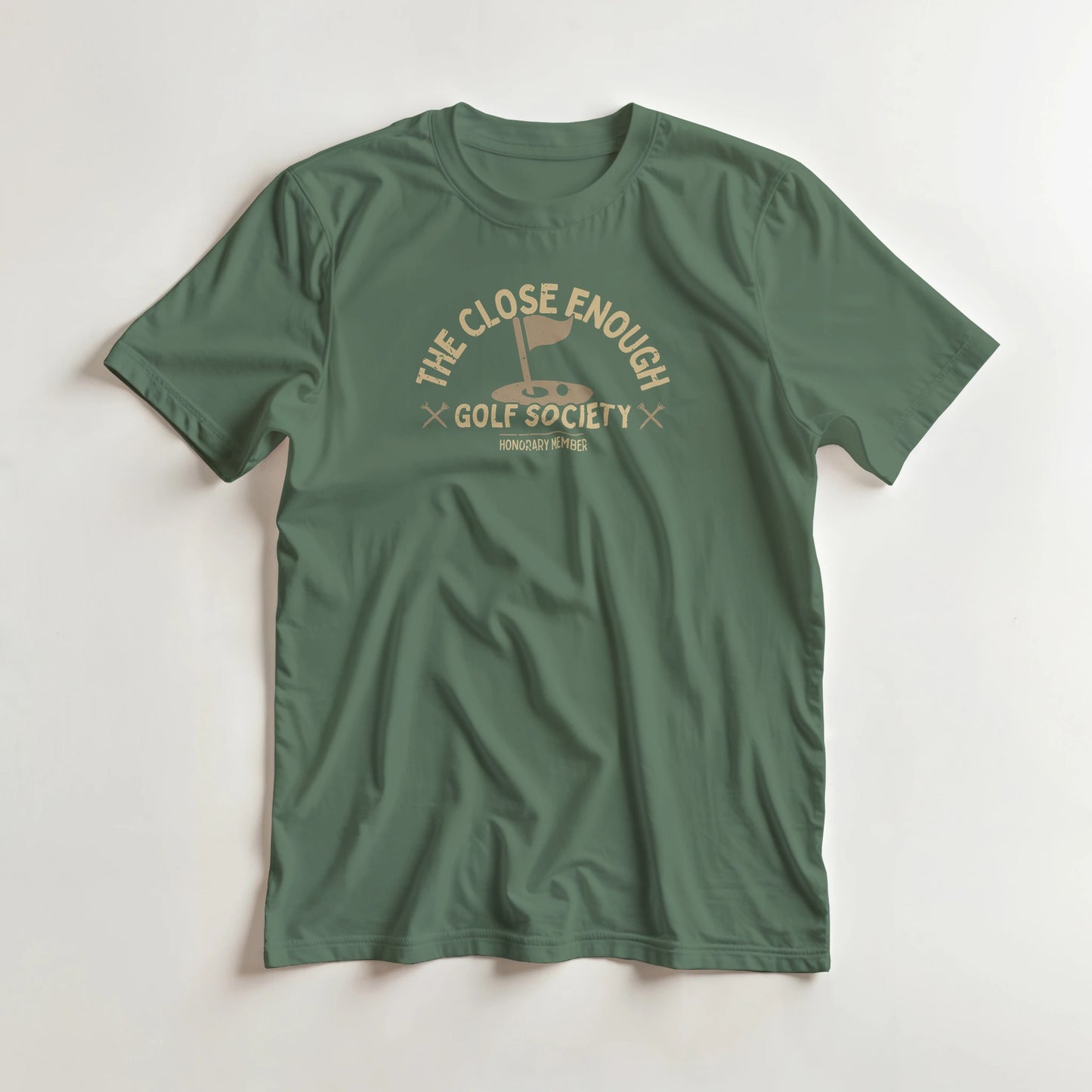 Close Enough T-Shirt in Military Green 3XL lying on a plain floor. T-shirt is a unisex cut and 100 per cent cotton.