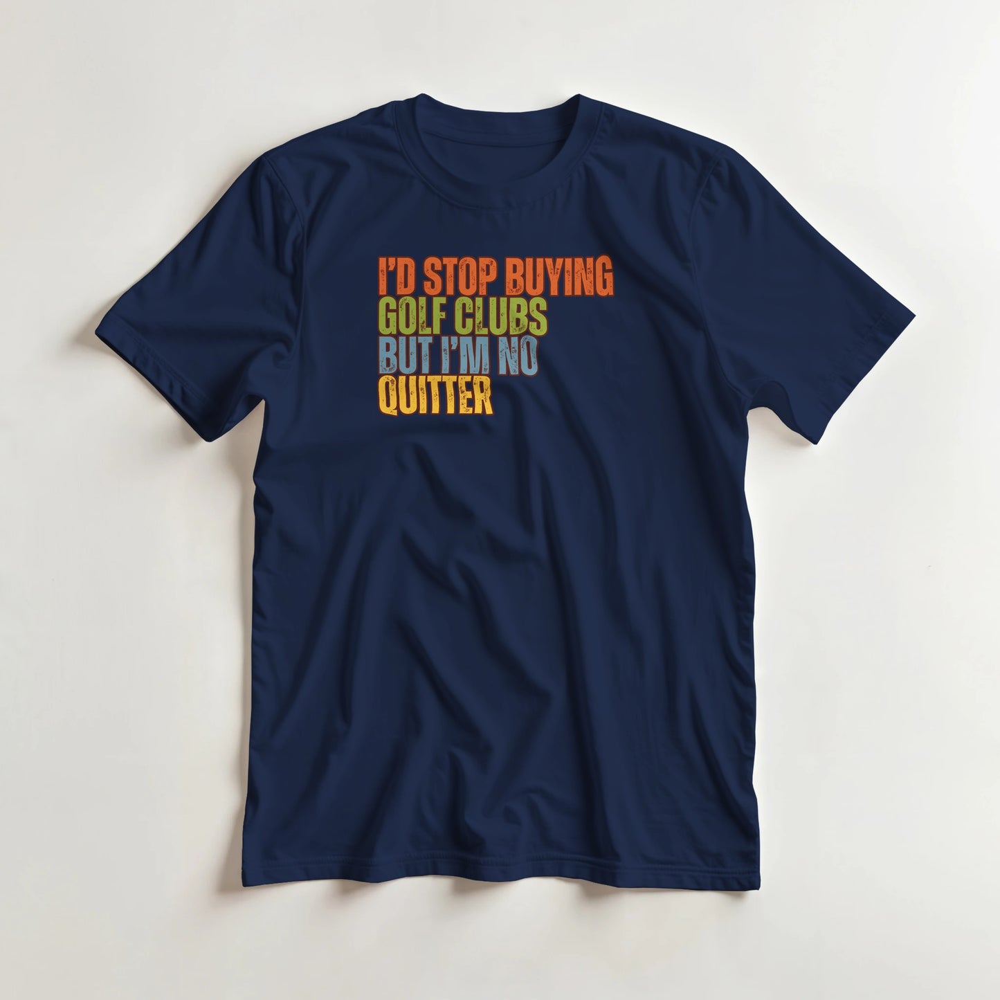 I'd Stop T-Shirt in Navy lying on a plain floor. T-shirt is a unisex cut and 100 per cent cotton.
