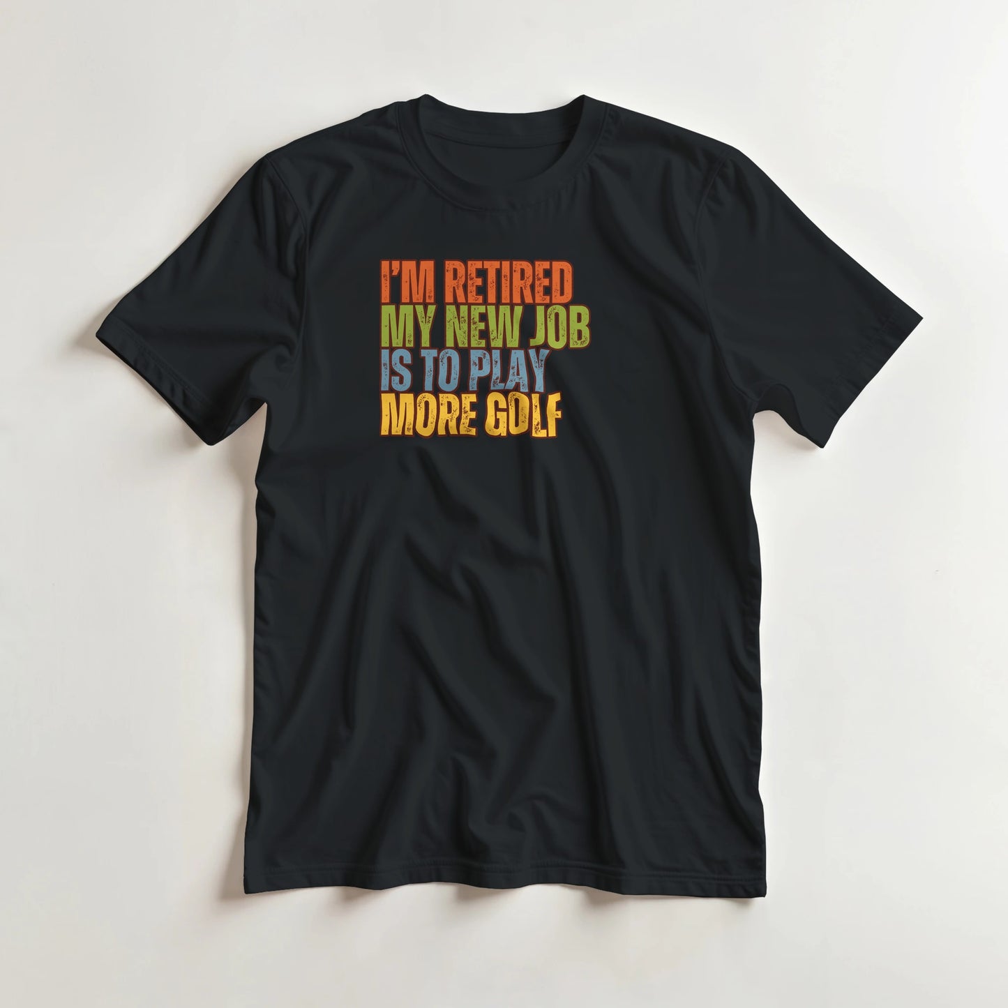 I'm Retired T-Shirt in Black XL lying on a plain floor. T-shirt is a unisex cut and 100 per cent cotton.